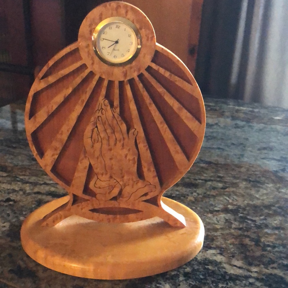 Handmade clock beautiful praying hands